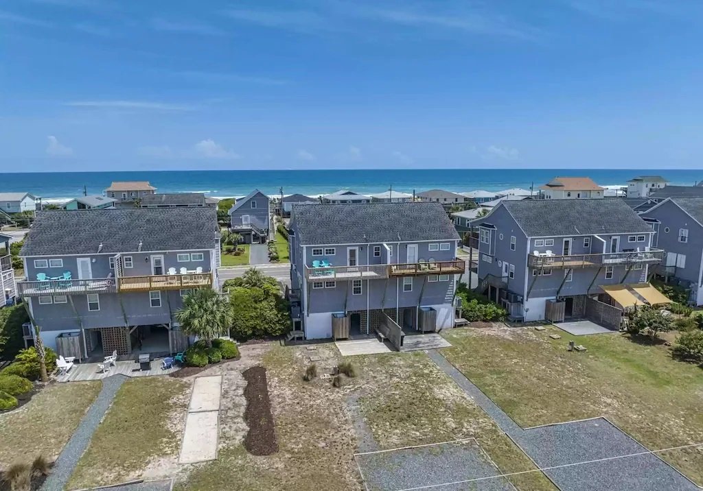 Rear Aerial view of townhome & yard